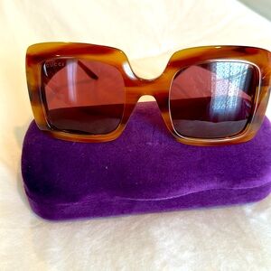 Gucci sunglasses in brown